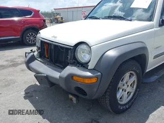2004 Jeep Liberty Sport with VIN 1J4GK48K54W153217, listed as a IAAI auction lot 42071897 with 106,921 mi miles and . Bid and sale history available at carsss.com. Image 6.