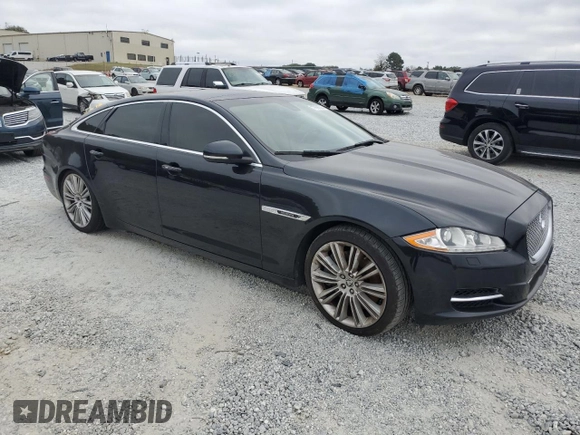 2012 Jaguar XJ Supercharged with VIN SAJWA2GE3CMV28747, listed as a Copart auction lot 77836394 with 139,731 mi miles and Clean title. Bid and sale history available at DreamBid. Image 4.