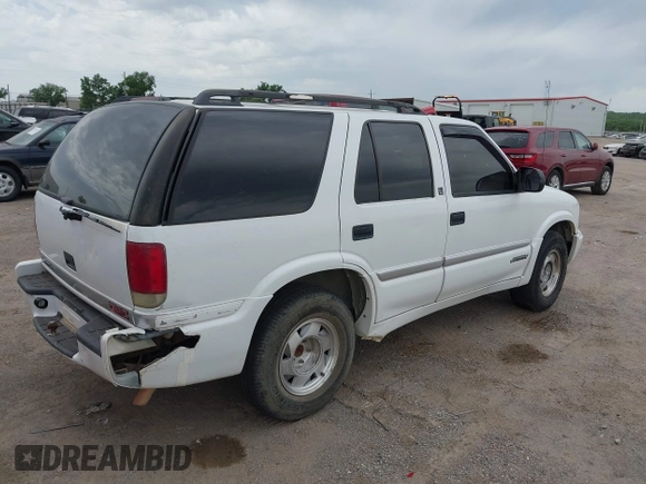 2001 GMC Jimmy SLE z VIN 1GKCS13W312208879, wystawiony jako IAAI lot #42284916 z przebiegiem 204 219 mil mil oraz . Historia ofert i sprzedaży dostępna na DreamBid. Obrazek 4.