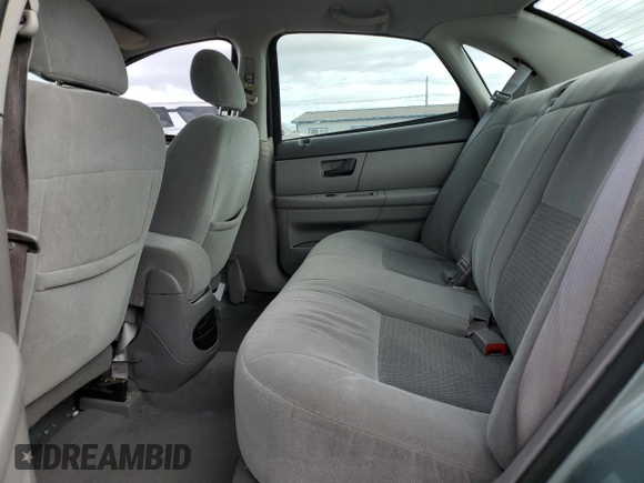 2006 Ford Taurus SE z VIN 1FAFP53U76A109890, wystawiony jako Copart lot #57135575 z przebiegiem 160 750 mil mil oraz Szkoda całkowita • Salvage title. Historia ofert i sprzedaży dostępna na DreamBid. Obrazek 10.