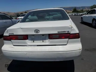 1997 Toyota Camry LE with VIN JT2BG22K7V0005405, listed as a Copart auction lot 58988545 with 268,952 mi miles and Salvage title. Bid and sale history available at DreamBid. Image 6.