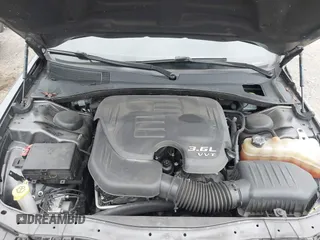 2019 Chrysler 300 S with VIN 2C3CCABG8KH601034, listed as a IAAI auction lot 41571454 with 104,632 mi miles and . Bid and sale history available at DreamBid. Image 10.