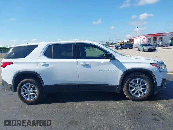 2021 Chevrolet Traverse LS with VIN 1GNERFKW0MJ240592, listed as a IAAI auction lot 42310680 with 59,986 mi miles and . Bid and sale history available at DreamBid. Image 13.