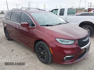 2021 Chrysler Pacifica Touring L with VIN 2C4RC1BG0MR574477, listed as a IAAI auction lot 42138491 with 79,611 mi miles and . Bid and sale history available at DreamBid. Image 1.