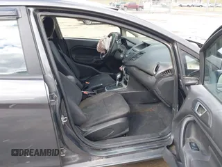2015 Ford Fiesta SE with VIN 3FADP4EJ0FM117739, listed as a IAAI auction lot 41795558 with 111,000 mi miles. Bid and sale history available at carsss.com. Image 5.