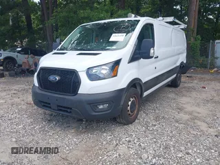 2023 Ford Transit Cargo z VIN 1FTYE1Y82PKA83403, wystawiony jako IAAI lot #42621450 z przebiegiem 44 617 mil mil oraz . Historia ofert i sprzedaży dostępna na DreamBid. Obrazek 17.
