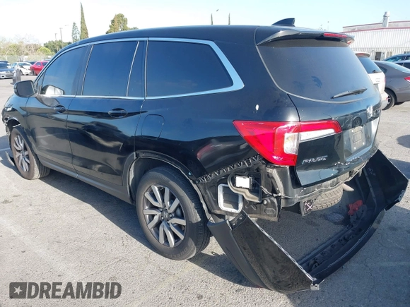 2021 Honda Pilot EX-L with VIN 5FNYF5H5XMB021833, listed as a IAAI auction lot 41935222 with 65,165 mi miles and . Bid and sale history available at carsss.com. Image 3.