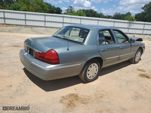 2005 Mercury Grand Marquis GS with VIN 2MEFM74W15X663557, listed as a Copart auction lot 65799904 with 107,483 mi miles and Salvage Title. Bid and sale history available at carsss.com. Image 3.