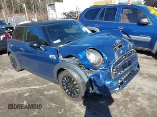 2014 MINI Hardtop S z VIN WMWXM7C50ET970873, wystawiony jako IAAI lot #41825192 z przebiegiem 104 020 mil mil oraz . Historia ofert i sprzedaży dostępna na DreamBid. Obrazek 1.