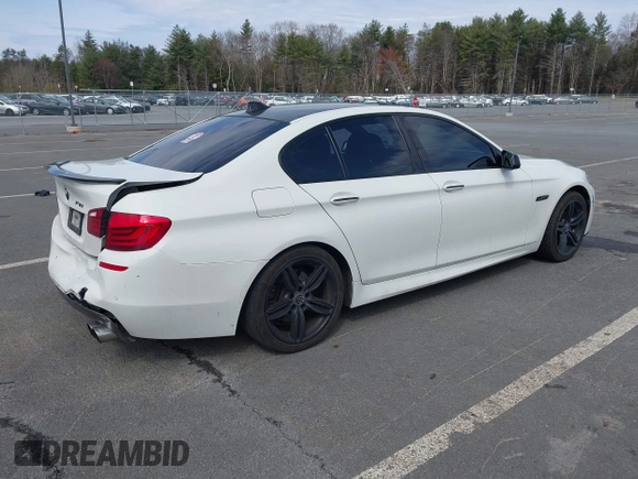 2013 BMW 5 Series 535i xDrive with VIN WBAFU7C51DDU68586, listed as a IAAI auction lot 41939159 with 111,496 mi miles and . Bid and sale history available at carsss.com. Image 4.