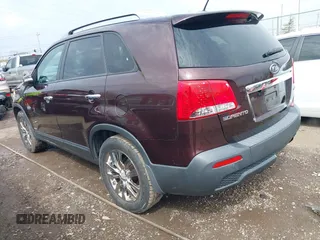 2011 Kia Sorento EX with VIN 5XYKUDA2XBG131874, listed as a IAAI auction lot 41901492 with 170,179 mi miles. Bid and sale history available at carsss.com. Image 3.