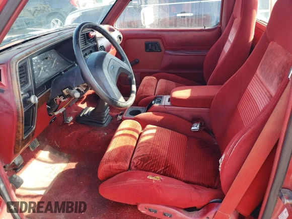 1989 Ford Ranger Splash with VIN 1FTCR10A2KUB58322, listed as a Copart auction lot 77710394 with 890,534 mi miles and Salvage Title. Bid and sale history available at DreamBid. Image 7.