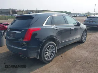 2018 Cadillac XT5 Luxury AWD with VIN 1GYKNDRSXJZ247863, listed as a IAAI auction lot 42392404 with 96,629 mi miles and . Bid and sale history available at DreamBid. Image 4.