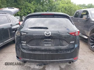 2018 Mazda CX-5 Grand Touring with VIN JM3KFBDM2J0400828, listed as a IAAI auction lot 42540846 with 254,672 mi miles and . Bid and sale history available at DreamBid. Image 16.