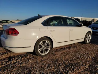 2014 Volkswagen Passat SEL Premium z VIN 1VWCN7A32EC081358, wystawiony jako Copart lot #56234195 z przebiegiem 147 383 mil mil oraz Tytuł czysty. Historia ofert i sprzedaży dostępna na DreamBid. Obrazek 3.