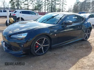 2019 Toyota 86 GT with VIN JF1ZNAE13K9701443, listed as a IAAI auction lot 41505696 with 67,876 mi miles. Bid and sale history available at carsss.com. Image 2.