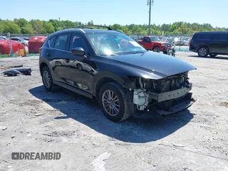 2018 Mazda CX-5 Sport with VIN JM3KFBBM4J0417018, listed as a IAAI auction lot 41984290 with 104,113 mi miles. Bid and sale history available at carsss.com. Image 1.