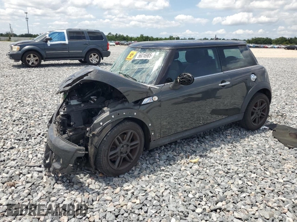 2011 MINI Hardtop S with VIN WMWSV3C55BTY20530, listed as a Copart auction lot 56016985 with Not Provided miles and Salvage Title. Bid and sale history available at DreamBid. Image 1.