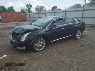 2016 Cadillac XTS Premium z VIN 2G61T5S39G9102402, wystawiony jako Copart lot #57179655 z przebiegiem 91 204 mil mil oraz Szkoda całkowita • Salvage title. Historia ofert i sprzedaży dostępna na DreamBid. Obrazek 1.