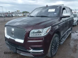 2018 Lincoln Navigator Black Label z VIN 5LMJJ2TT0JEL18765, wystawiony jako IAAI lot #41889782 z przebiegiem 72 190 mil mil oraz . Historia ofert i sprzedaży dostępna na DreamBid. Obrazek 2.