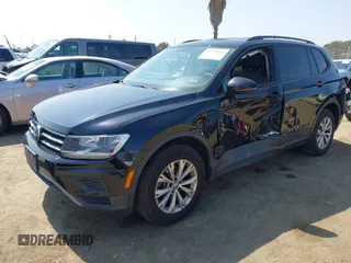 2018 Volkswagen Tiguan S with VIN 3VV1B7AX7JM092033, listed as a IAAI auction lot 42373619 with 124,775 mi miles and . Bid and sale history available at DreamBid. Image 17.