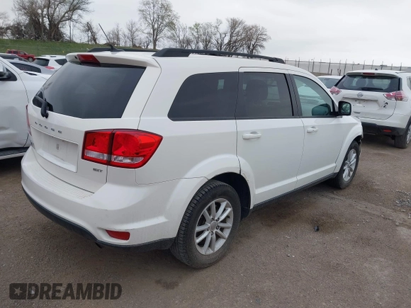 2014 Dodge Journey SXT z VIN 3C4PDCBB9ET222226, wystawiony jako IAAI lot #42056579 z przebiegiem 105 139 mil mil oraz . Historia ofert i sprzedaży dostępna na DreamBid. Obrazek 4.