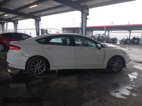 2017 Ford Fusion SE with VIN 3FA6P0H74HR196954, listed as a IAAI auction lot 41636002 with 70,366 mi miles and . Bid and sale history available at DreamBid. Image 13.