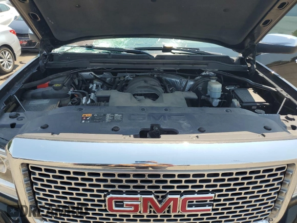 2015 GMC Sierra 1500 Denali z VIN 3GTU2WEC3FG103130, wystawiony jako Copart lot #60243545 z przebiegiem 139 382 mil mil oraz Szkoda całkowita • Salvage title. Historia ofert i sprzedaży dostępna na DreamBid. Obrazek 11.
