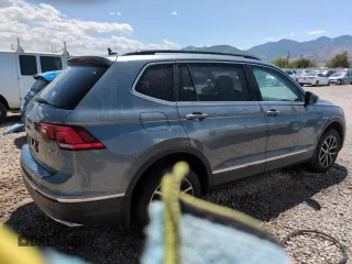 2021 Volkswagen Tiguan SE with VIN 3VV2B7AXXMM049055, listed as a Copart auction lot 59815645 with 51,116 mi miles and Clean title. Bid and sale history available at DreamBid. Image 3.