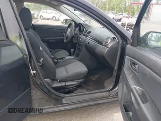 2008 Mazda 3 i Sport with VIN JM1BK32F881163958, listed as a IAAI auction lot 42088111 with 160,585 mi miles and . Bid and sale history available at DreamBid. Image 5.