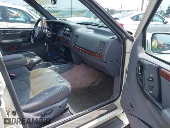 1996 Jeep Grand Cherokee Limited with VIN 1J4GZ78Y1TC381474, listed as a IAAI auction lot 42467661 with 155,587 mi miles and . Bid and sale history available at DreamBid. Image 5.