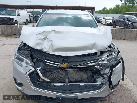2020 Chevrolet Traverse LT with VIN 1GNERHKW3LJ237616, listed as a IAAI auction lot 42272845 with 87,104 mi miles and . Bid and sale history available at DreamBid. Image 6.