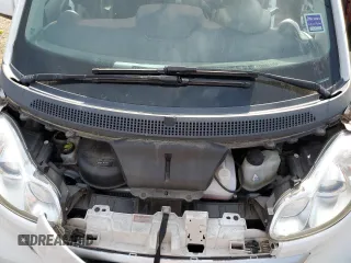 2015 Smart fortwo Passion z VIN WMEEJ3BA8FK800733, wystawiony jako Copart lot #57268944 z przebiegiem Nie podano mil oraz Szkoda całkowita • Salvage title. Historia ofert i sprzedaży dostępna na DreamBid. Obrazek 11.