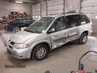 2003 Dodge Grand Caravan with VIN 2D4GP44353R166193, listed as a IAAI auction lot 41908698 with 181,371 mi miles and . Bid and sale history available at DreamBid. Image 17.