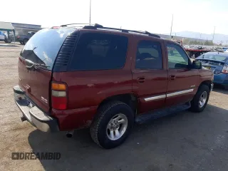 2003 GMC Yukon SLT with VIN 1GKEC13V43J171962, listed as a Copart auction lot 63244534 with 200,159 mi miles and Salvage Title. Bid and sale history available at carsss.com. Image 3.