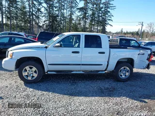 2006 Dodge Dakota SLT with VIN 1D7HW48N26S710819, listed as a IAAI auction lot 41691700 with 110,269 mi miles. Bid and sale history available at carsss.com. Image 14.
