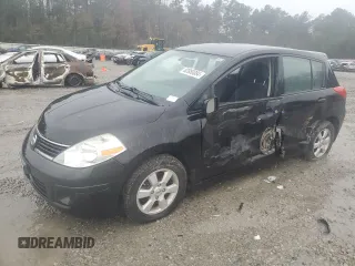 2009 Nissan Versa 1.8 SL with VIN 3N1BC13EX9L496828, listed as a Copart auction lot 82880084 with 0 mi miles and Salvage Title. Bid and sale history available at carsss.com. Image 1.