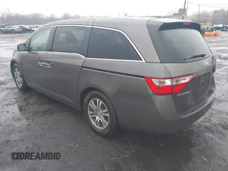 2012 Honda Odyssey EX-L with VIN 5FNRL5H64CB037689, listed as a IAAI auction lot 41857822 with 121,601 mi miles and . Bid and sale history available at carsss.com. Image 3.