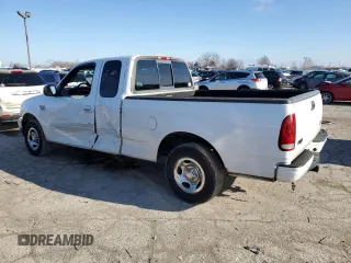 2000 Ford F-150 XL with VIN 1FTRX17L8YNB40935, listed as a Copart auction lot 86726884 with 260,636 mi miles and Salvage Title. Bid and sale history available at carsss.com. Image 2.