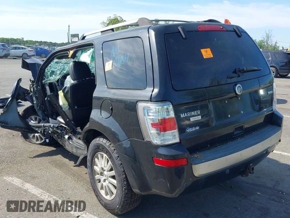 2011 Mercury Mariner Premier with VIN 4M2CN9HG7BKJ01459, listed as a IAAI auction lot 42231597 with 168,362 mi miles and . Bid and sale history available at DreamBid. Image 3.