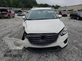 2016 Mazda CX-5 Sport with VIN JM3KE2BY0G0843786, listed as a Copart auction lot 54451275 with 111,363 mi miles and Salvage title. Bid and sale history available at DreamBid. Image 5.