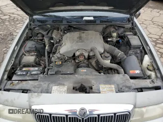 2000 Mercury Grand Marquis LS z VIN 2MEFM75WXYX742065, wystawiony jako Copart lot #57655795 z przebiegiem 175 070 mil mil oraz Tytuł czysty. Historia ofert i sprzedaży dostępna na DreamBid. Obrazek 11.