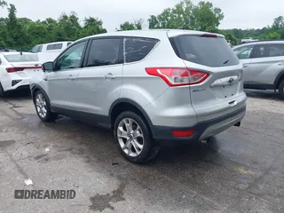 2013 Ford Escape SEL z VIN 1FMCU9H97DUA34665, wystawiony jako IAAI lot #42258567 z przebiegiem 174 227 mil mil oraz . Historia ofert i sprzedaży dostępna na DreamBid. Obrazek 3.