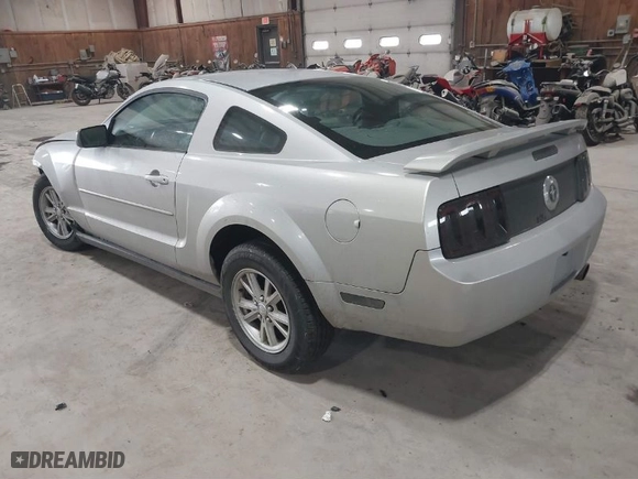 2008 Ford Mustang Deluxe with VIN 1ZVHT80N285185877, listed as a IAAI auction lot 41694049 with 83015 miles. Bid and sale history available at carsss.com. Image 3.