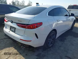 2021 BMW 2 Series 228i with VIN WBA53AK09M7H30650, listed as a IAAI auction lot 42043390 with 89,611 mi miles and . Bid and sale history available at DreamBid. Image 4.