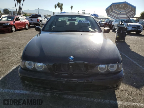 2003 BMW 5 Series 525i with VIN WBADT33433GF43797, listed as a Copart auction lot 70476904 with 194,319 mi miles and Salvage Title. Bid and sale history available at carsss.com. Image 5.