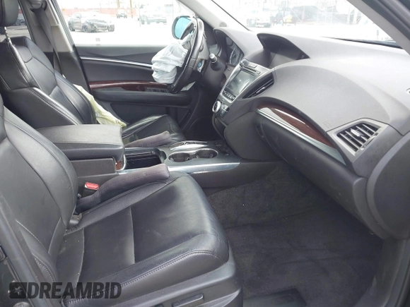 2016 Acura MDX w/Tech with VIN 5FRYD3H47GB020014, listed as a IAAI auction lot 41931725 with 121,520 mi miles. Bid and sale history available at carsss.com. Image 5.