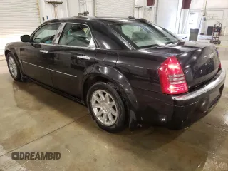 2005 Chrysler 300 C z VIN 2C3JA63H55H119210, wystawiony jako Copart lot #54727045 z przebiegiem 148 202 mil mil oraz Szkoda całkowita • Salvage title. Historia ofert i sprzedaży dostępna na DreamBid. Obrazek 2.