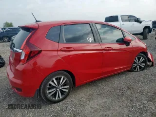 2018 Honda Fit EX-L with VIN 3HGGK5H97JM706911, listed as a Copart auction lot 57121595 with 117,375 mi miles and Salvage title. Bid and sale history available at DreamBid. Image 3.