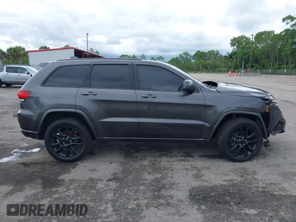 2018 Jeep Grand Cherokee Altitude z VIN 1C4RJEAG2JC428214, wystawiony jako IAAI lot #42661661 z przebiegiem 81 859 mil mil oraz . Historia ofert i sprzedaży dostępna na DreamBid. Obrazek 14.